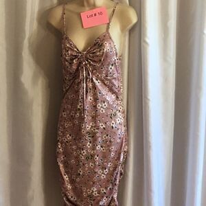 Bodycon dress in medium with tie adjustments at bust, on hips for length